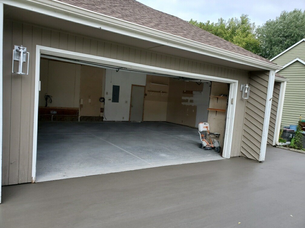 Smooth trowel-finish garage slab ready for epoxy in Brainerd